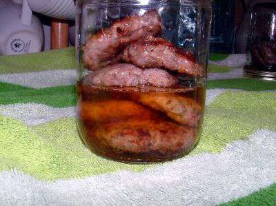 Adding grease to canned sausage
