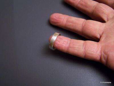 Ed ammons shows how to make a silver ring from a quarter