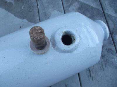 10 inch long pottery piece with cork